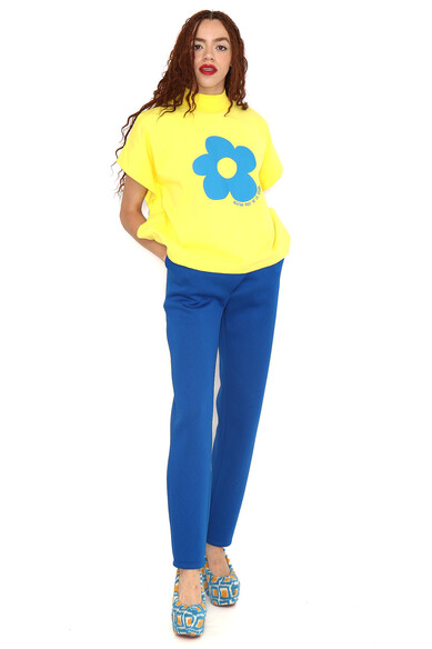 Agatha ruiz de la prada PONCHO FLOR AMARILLO Ahorra y exporta