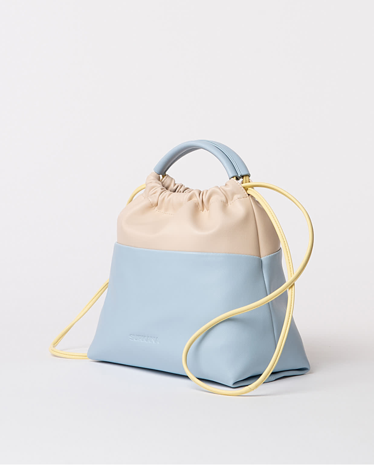 surkana Bolso efecto piel bicolor Azul celeste Devoluciones gratuitas