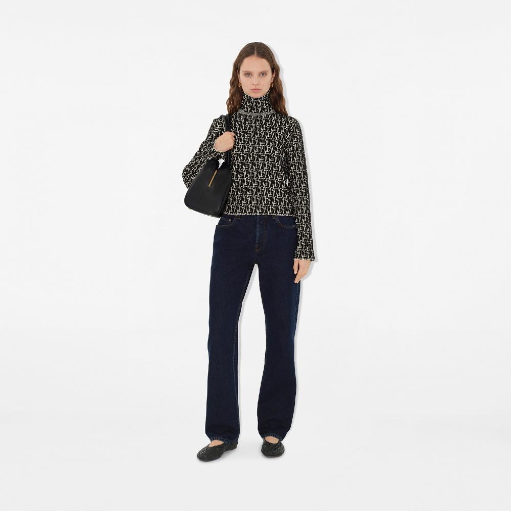 Burberry Jersey en mezcla de lana con motivo B CharmPrecio 1.350 00 € Solo queda un día