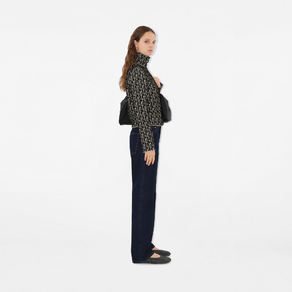 Burberry Jersey en mezcla de lana con motivo B CharmPrecio 1.350 00 € Solo queda un día