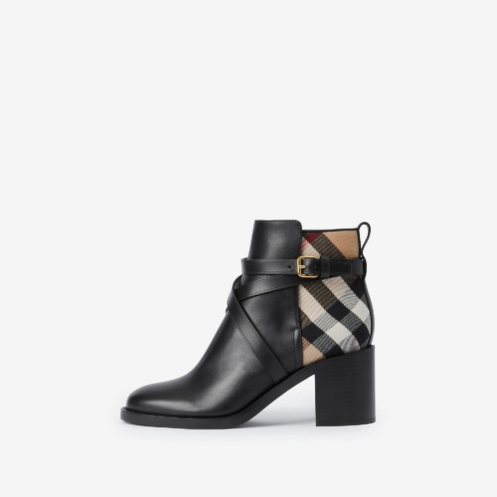 Burberry Botines en piel con tacón y paneles CheckPrecio 820 00 € Disponibilidad limitada Últimos 2 días