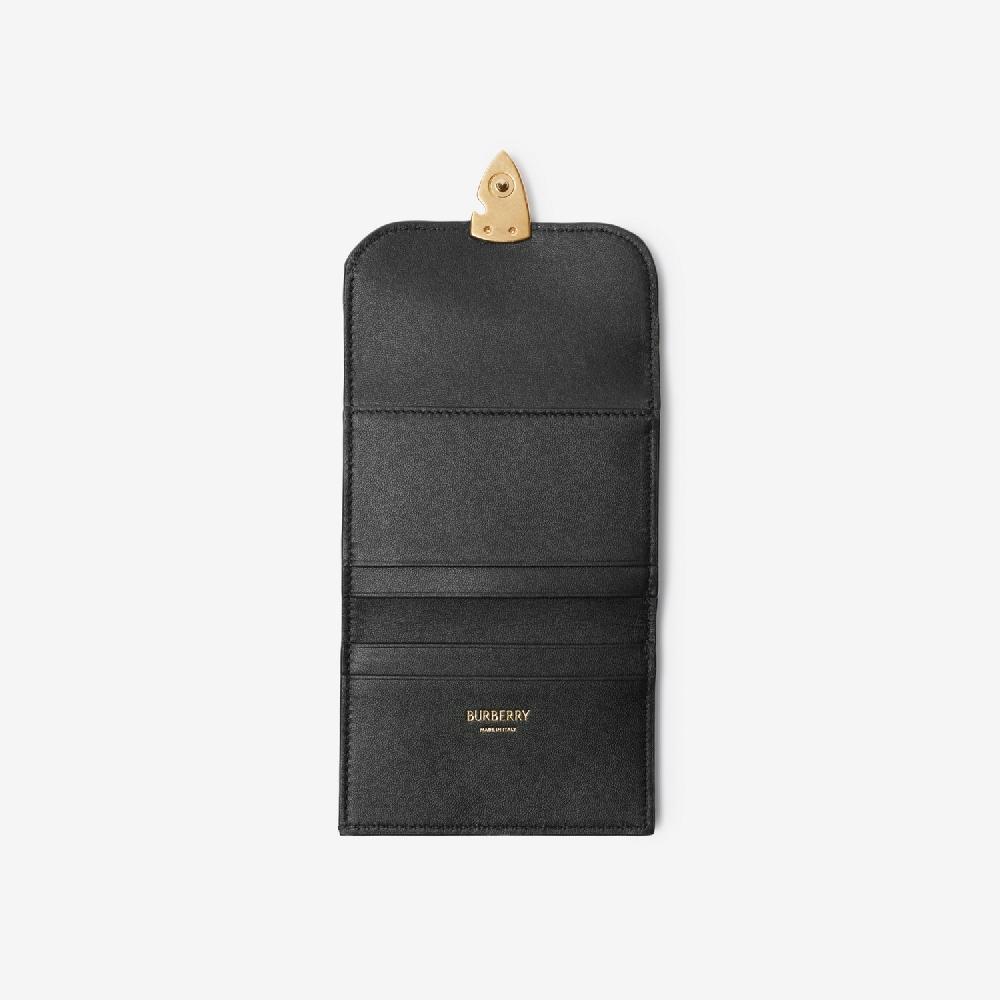 Burberry Cartera B ShieldPrecio 590 00 € Personalizable con iniciales Envío gratis