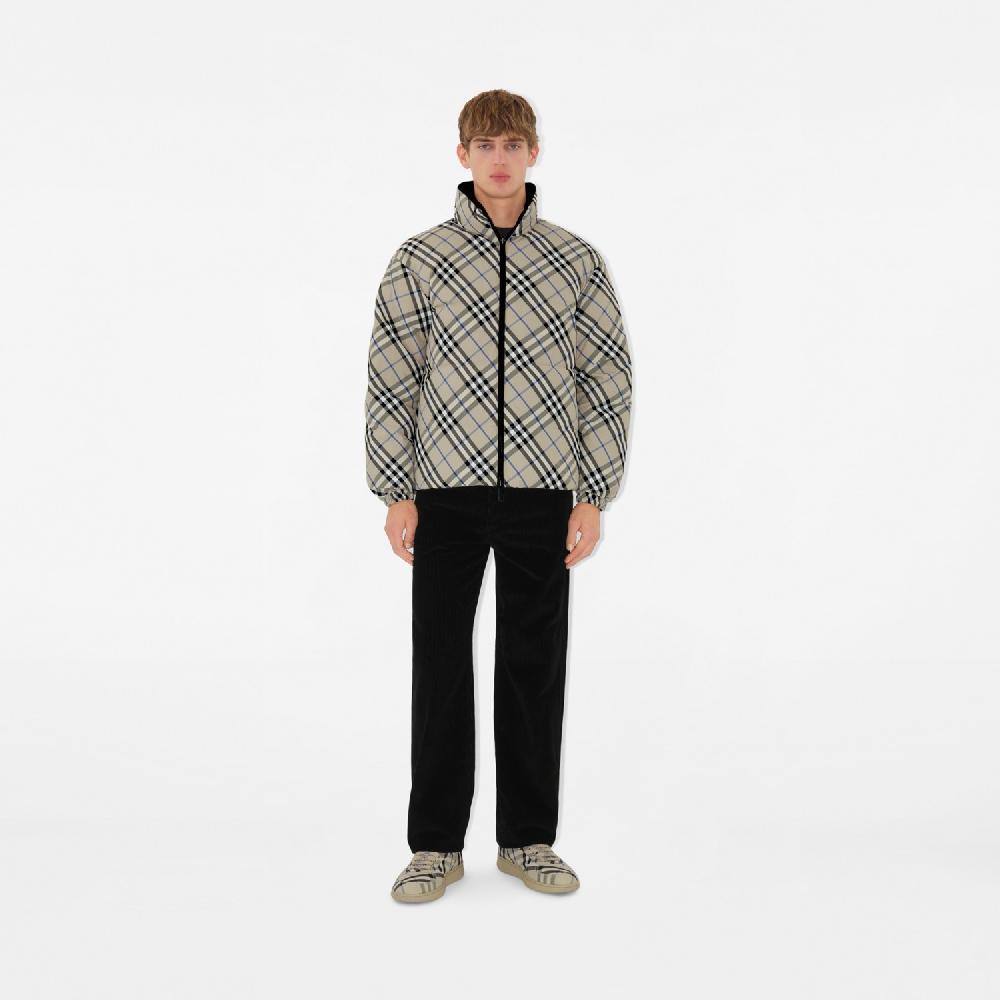 Burberry Chaqueta de plumas reversible en nailon CheckPrecio 1.690 00 € Precio de fábrica