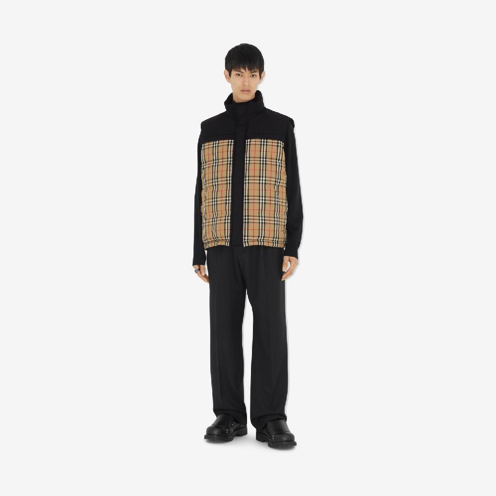 Burberry Chaleco de plumas reversible CheckPrecio 1.590 00 € Promoción trimestral