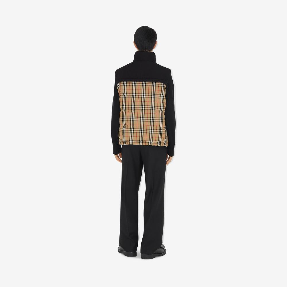 Burberry Chaleco de plumas reversible CheckPrecio 1.590 00 € Promoción trimestral
