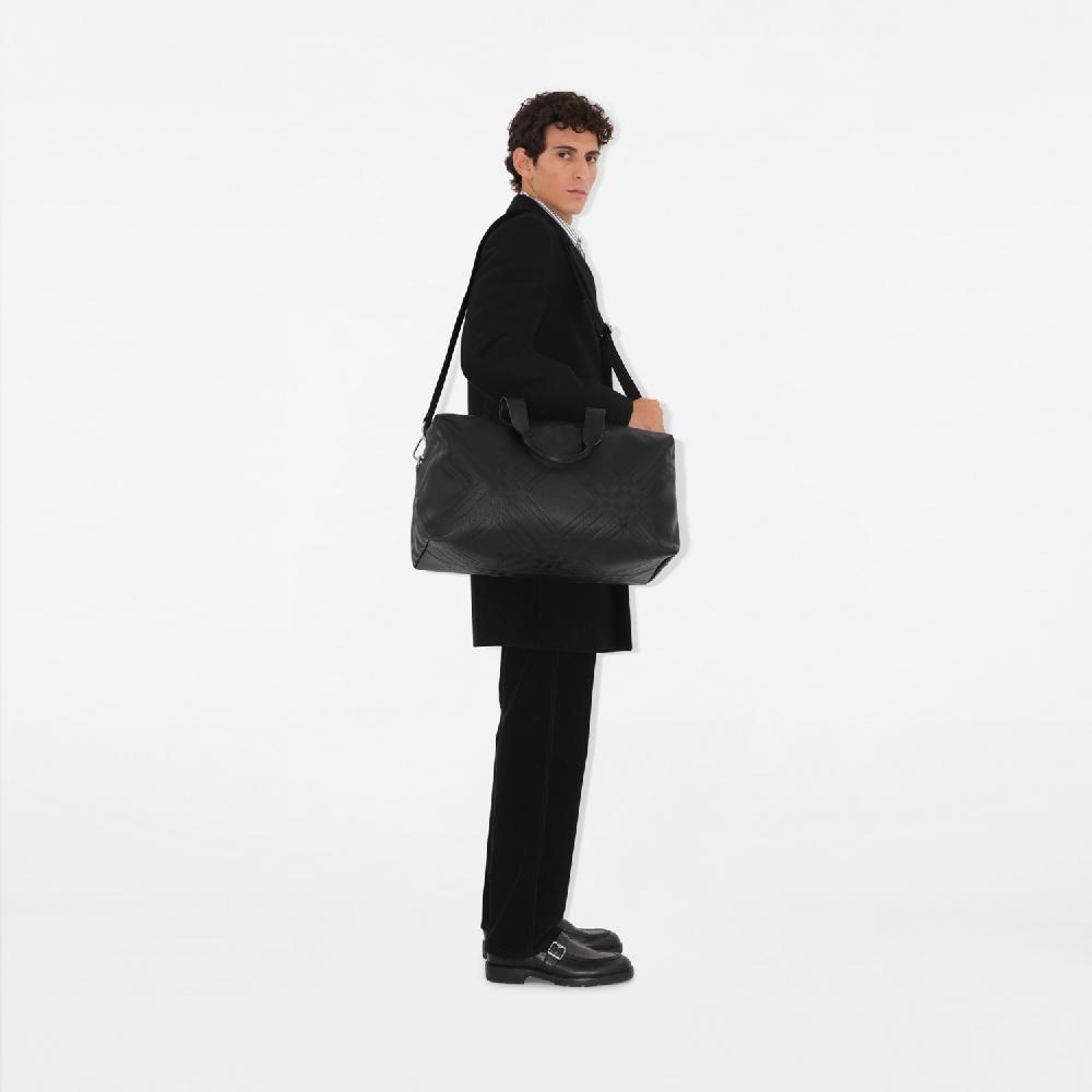 Burberry Bolso de viaje con motivo a cuadros grabadoPrecio 2.190 00 € Solo hoy