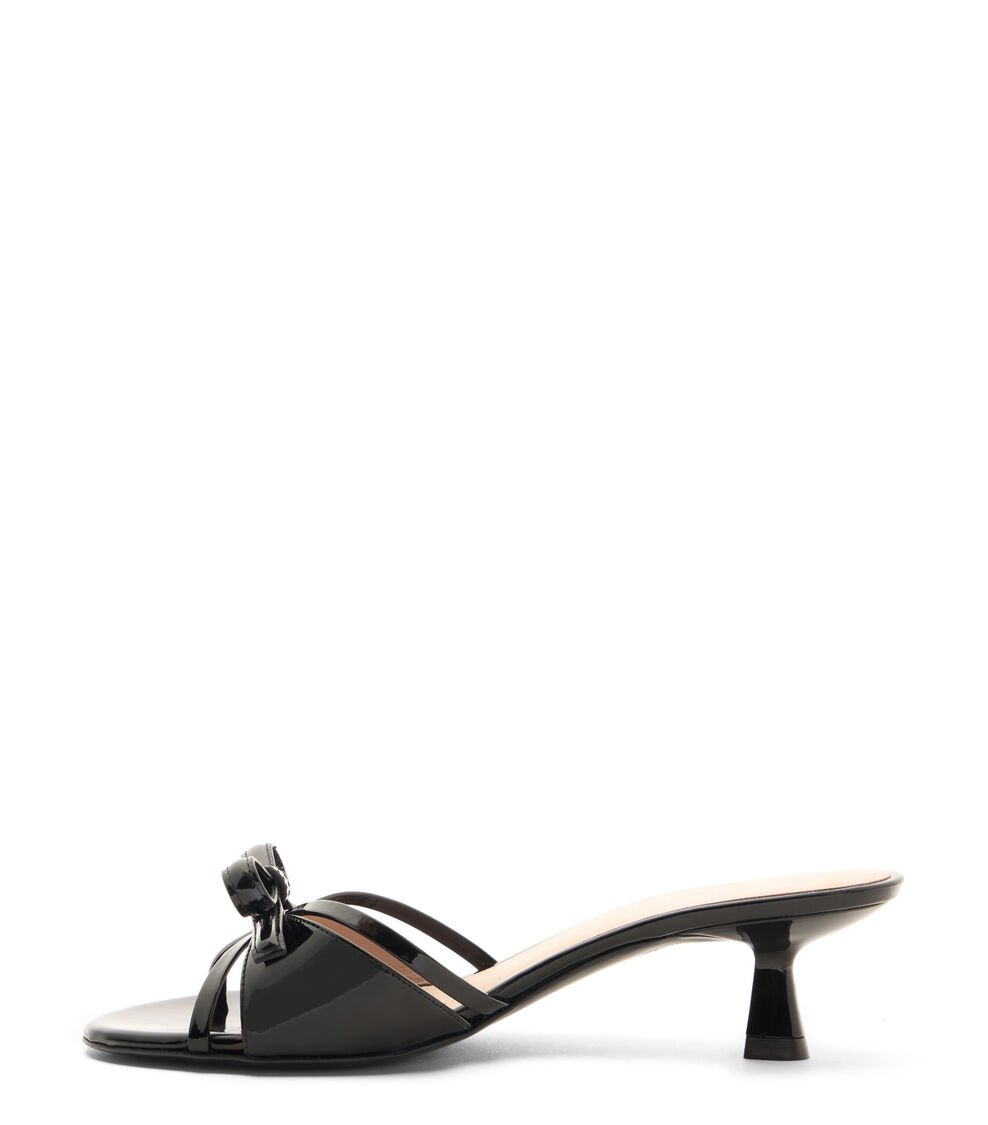 Stuart Weitzman FELICITY BOW 50 SLIDE en NEGRO de Mujer | Stuart Weitzman® Última moda