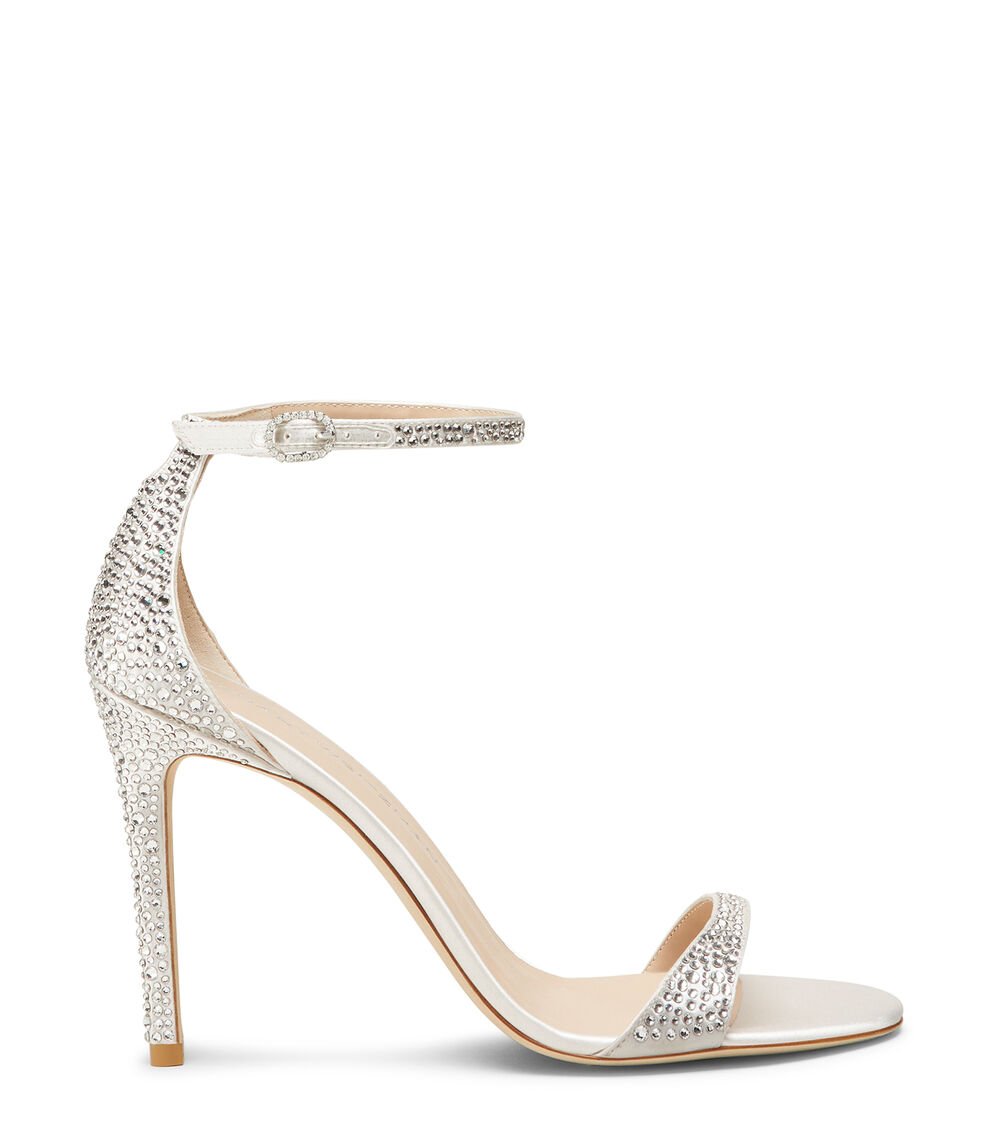 Stuart Weitzman NUDIST SHINE 100 SANDAL en CLARO/CREMA de Mujer | Stuart Weitzman® Último día