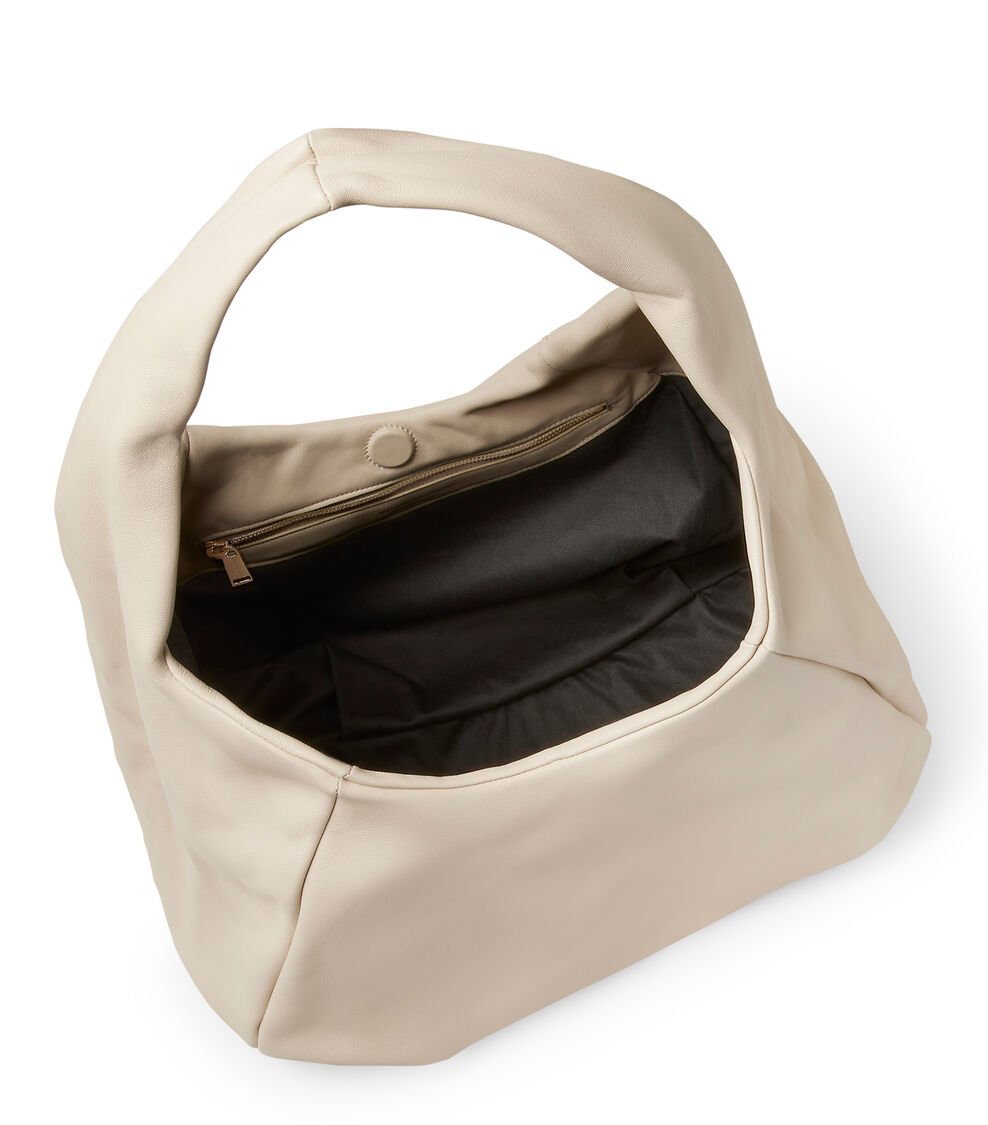 Stuart Weitzman THE MODA HOBO BAG en AVENA de Mujer | Stuart Weitzman® Envío internacional gratuito