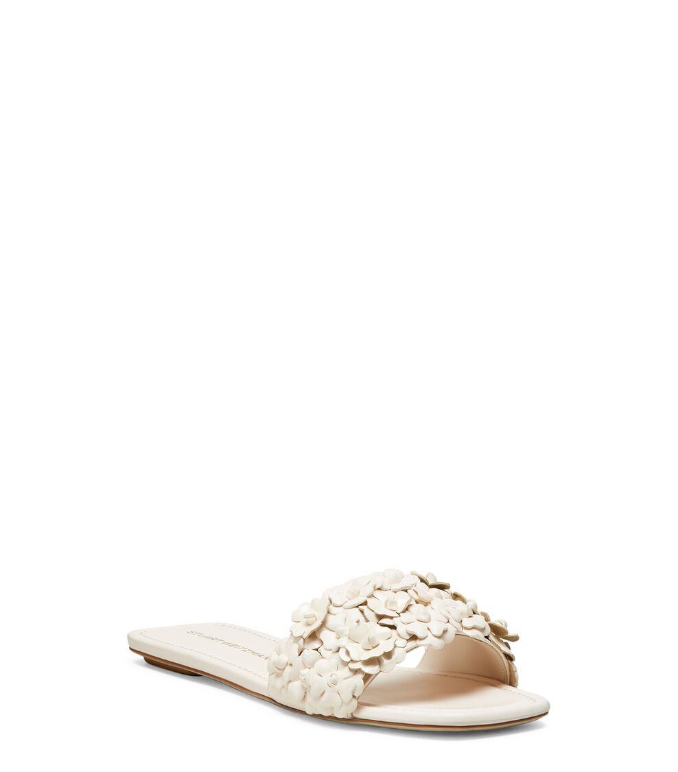 Stuart Weitzman MEADOW FLAT SLIDE en SEASHELL de Mujer | Stuart Weitzman® ÚLTIMAS EDICIONES