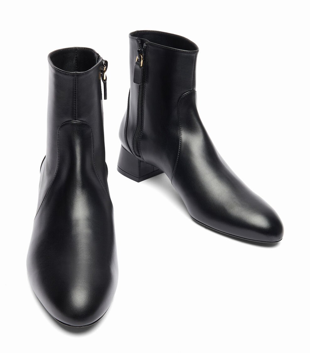 Stuart Weitzman VIVIENNE 35 ZIP BOOTIE en NEGRO de Mujer | Stuart Weitzman® Ahorra y exporta