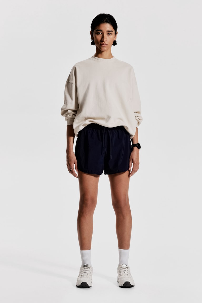 H&M Pantalón corto de correr en tejido ligero - Azul marino - MUJER Promoción por tiempo limitado