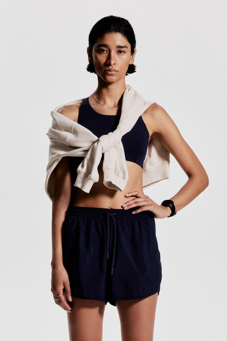 H&M Pantalón corto de correr en tejido ligero - Azul marino - MUJER Promoción por tiempo limitado