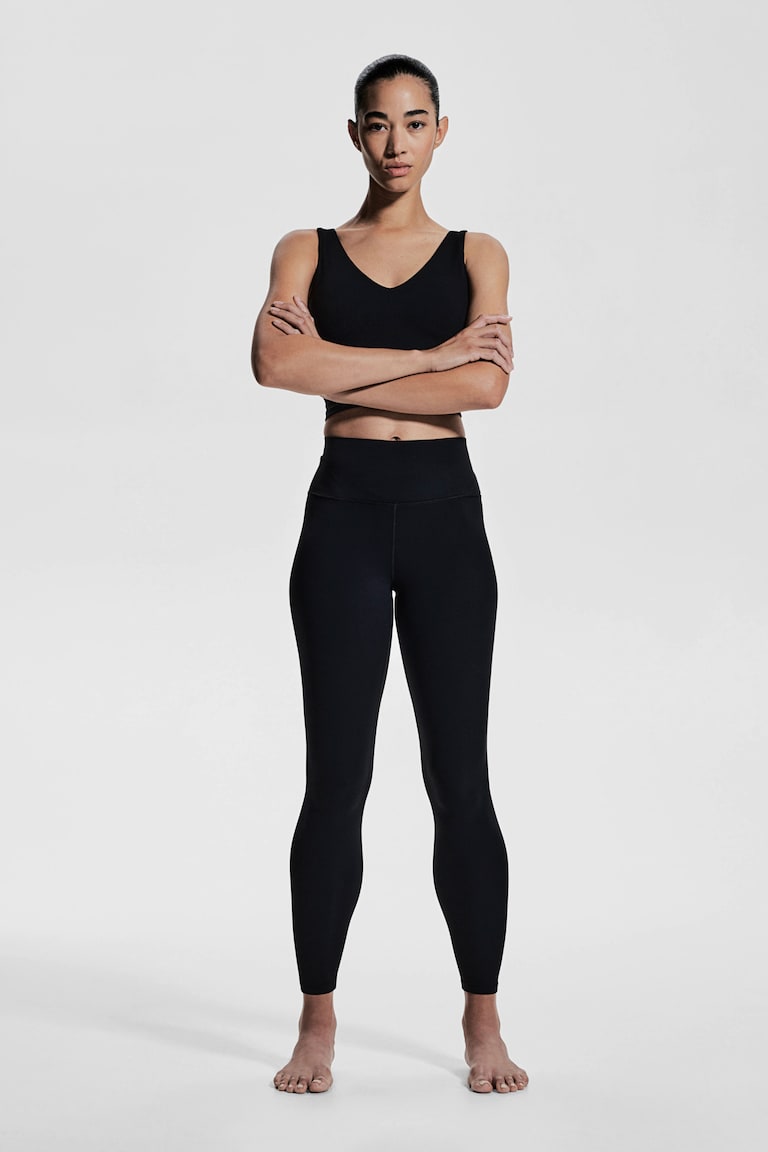 H&M Leggings de yoga tobilleros con SoftMove™ Lycra® - Gris oscuro - MUJER
