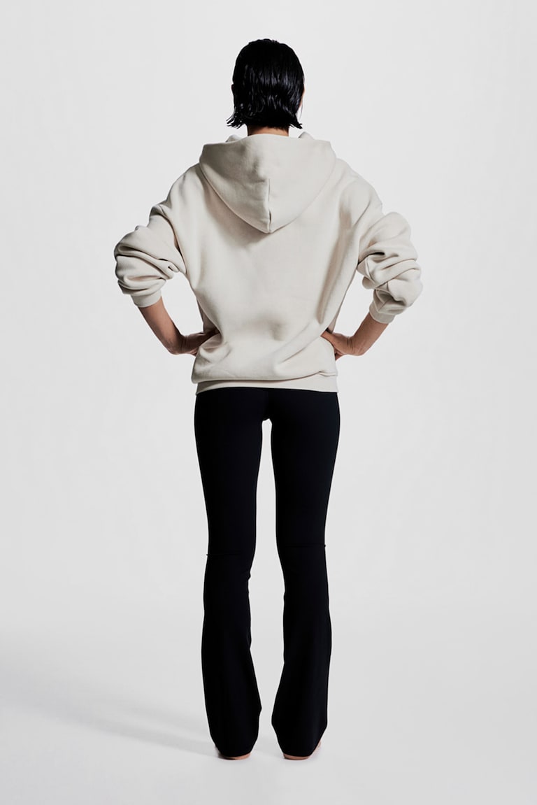 H&M Leggings de yoga acampanados con SoftMove™ Lycra® - Negro - MUJER Precio de fábrica