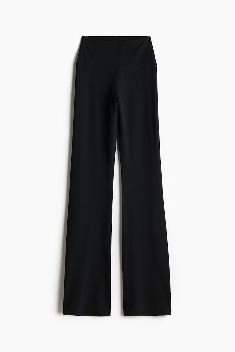 H&M Leggings de yoga acampanados con SoftMove™ Lycra® - Marrón oscuro - MUJER Promoción por tiempo limitado