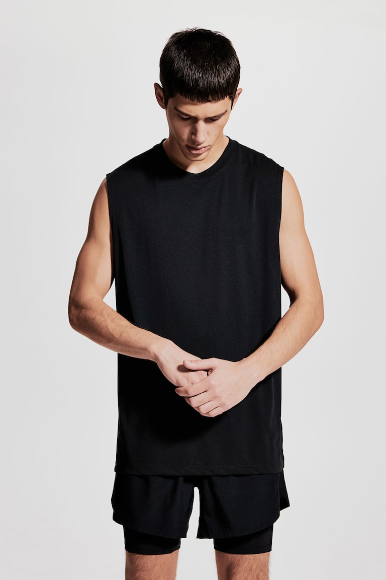 H&M Camiseta de deporte con DryMove™ Regular Fit - Negro - HOMBRE Rebajas de fin de temporada