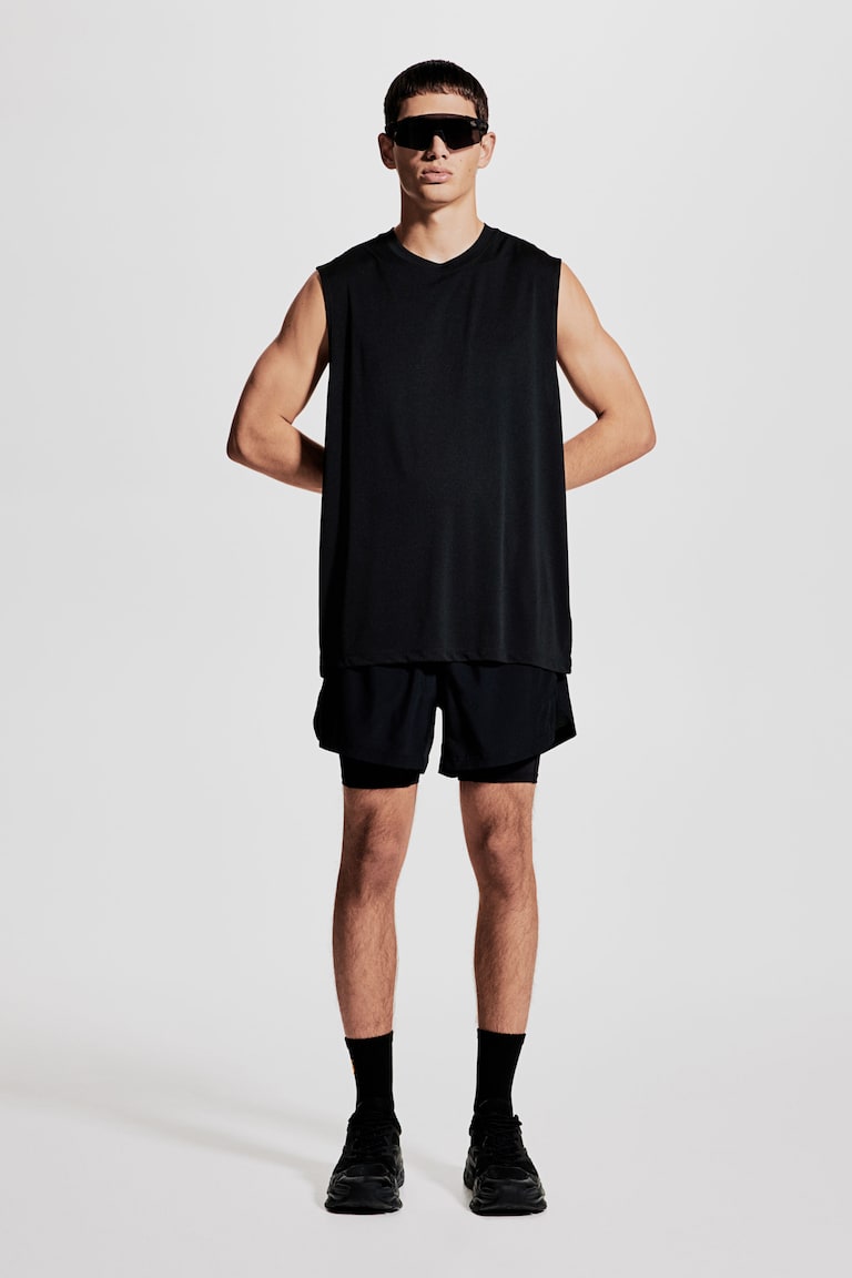 H&M Camiseta de deporte con DryMove™ Regular Fit - Verde - HOMBRE
