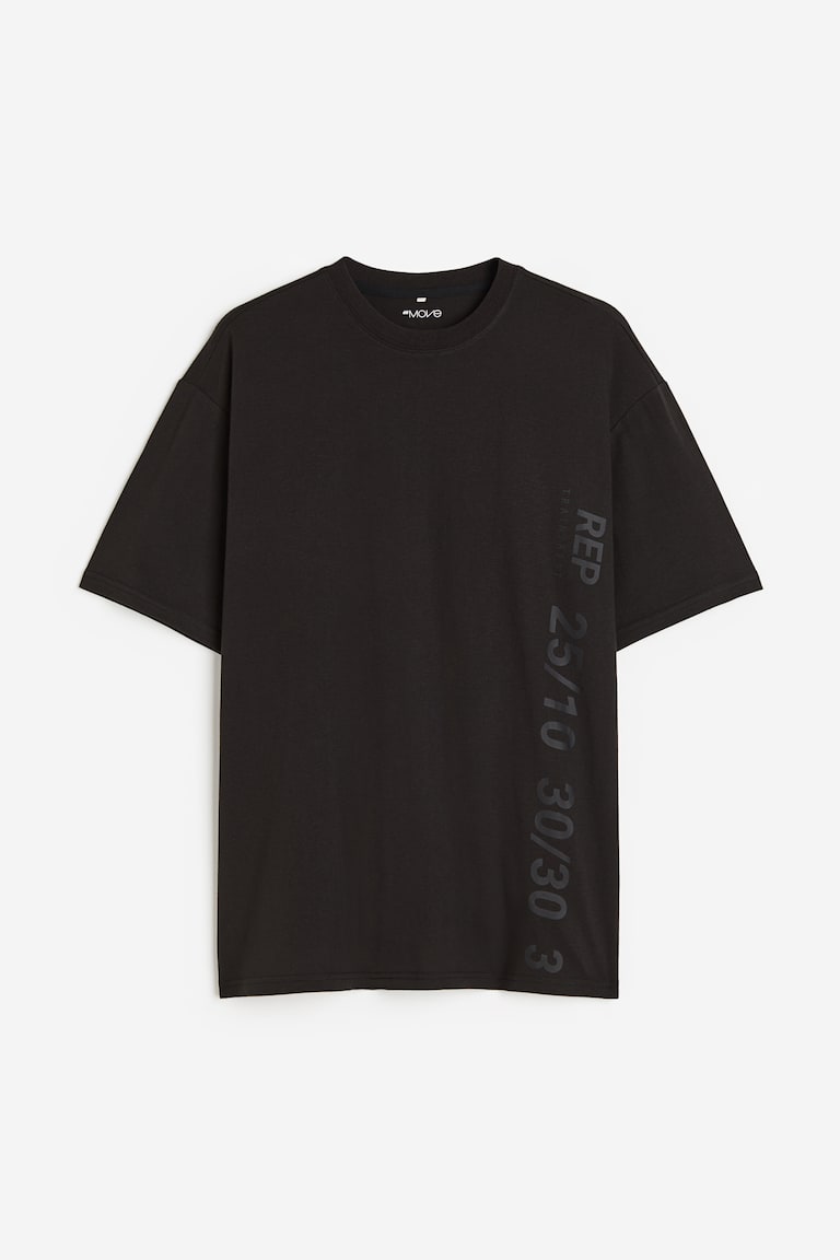H&M Camiseta de deporte con DryMove™ Loose Fit - Gris/Dopamine - HOMBRE