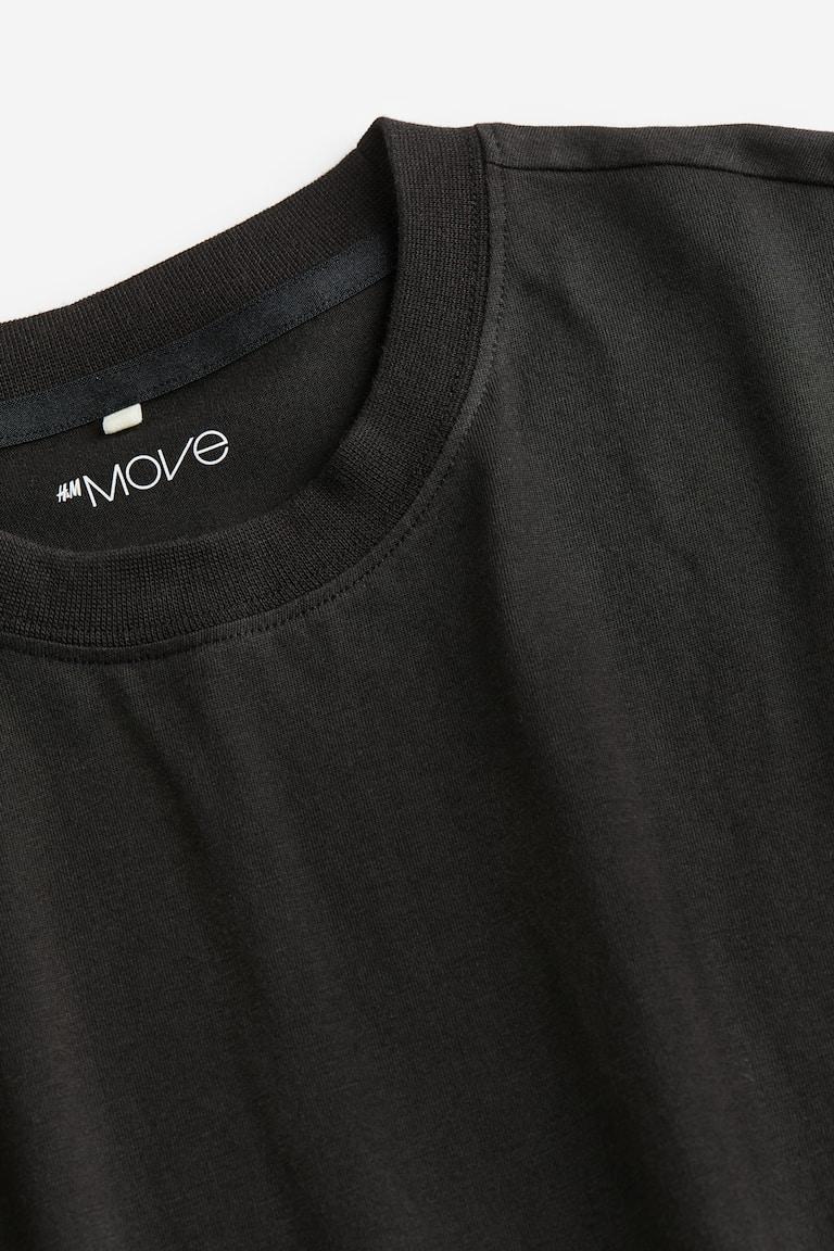 H&M Camiseta de deporte con DryMove™ Loose Fit - Gris/Dopamine - HOMBRE Envío gratis