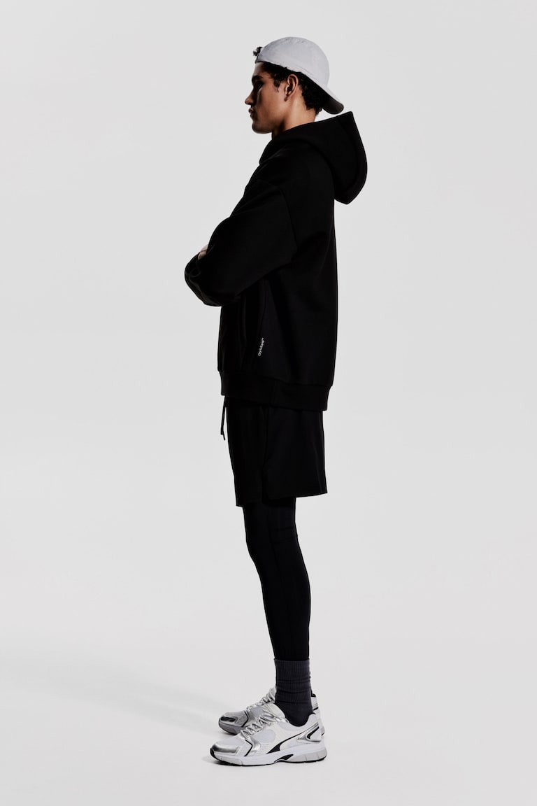 H&M Sudadera de deporte con DryMove™ Loose Fit - Negro/Dopamine - HOMBRE