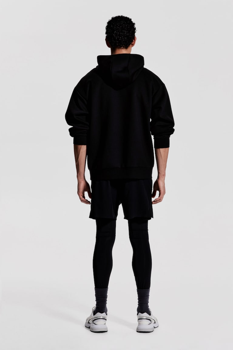 H&M Sudadera de deporte con DryMove™ Loose Fit - Negro - HOMBRE Últimos 2 días