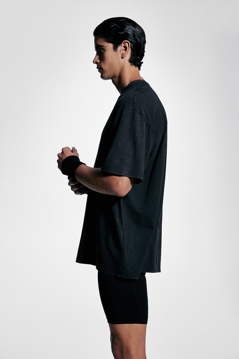 H&M Camiseta de deporte con DryMove™ Loose Fit - Negro - HOMBRE Solo hoy