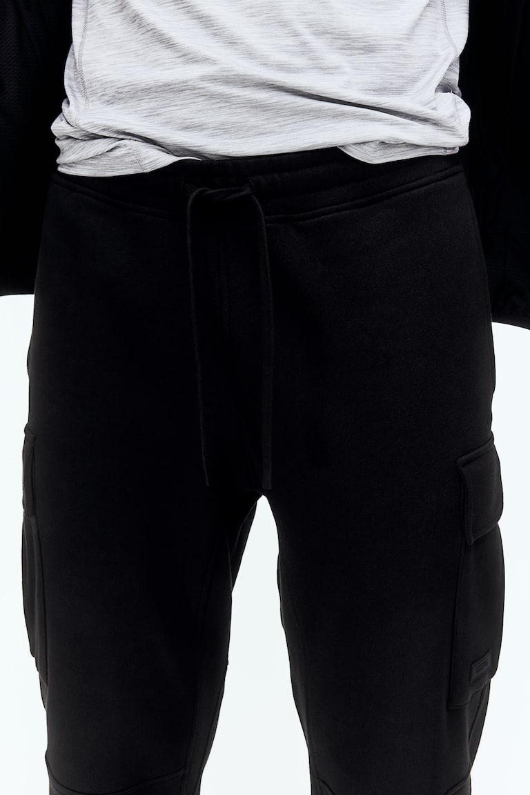 H&M Joggers cargo de algodón con DryMove™ Regular Fit - Gris oscuro - HOMBRE Promoción trimestral