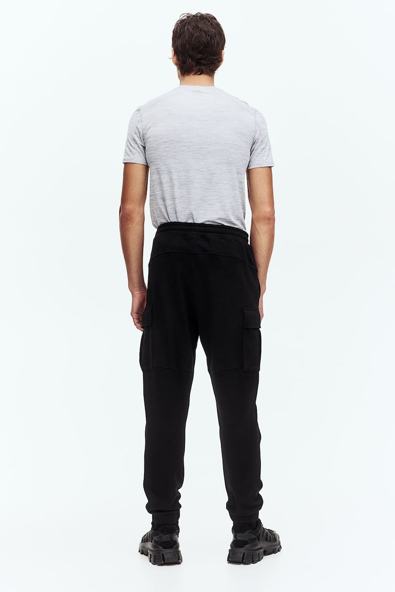 H&M Joggers cargo de algodón con DryMove™ Regular Fit - Negro - HOMBRE Solo queda un día