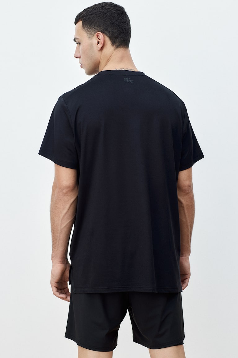 H&M Camiseta de deporte con DryMove™ Regular Fit - Azul oscuro - HOMBRE Superdescuento