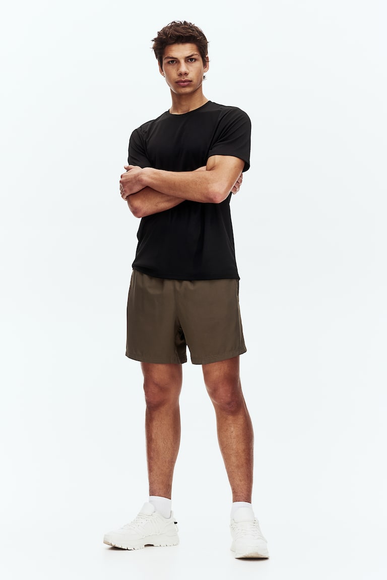 H&M Camiseta de deporte con DryMove™ Regular Fit - Negro - HOMBRE