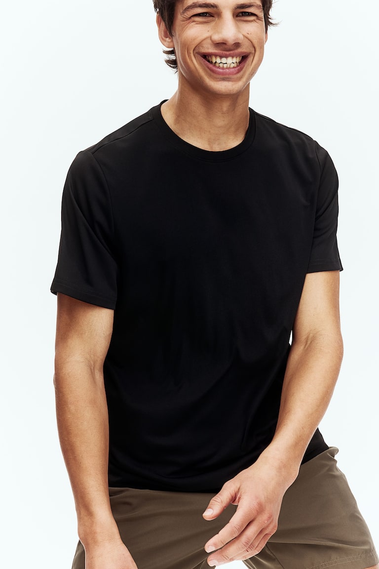 H&M Camiseta de deporte con DryMove™ Regular Fit - Turquesa - HOMBRE Precios de Black Friday